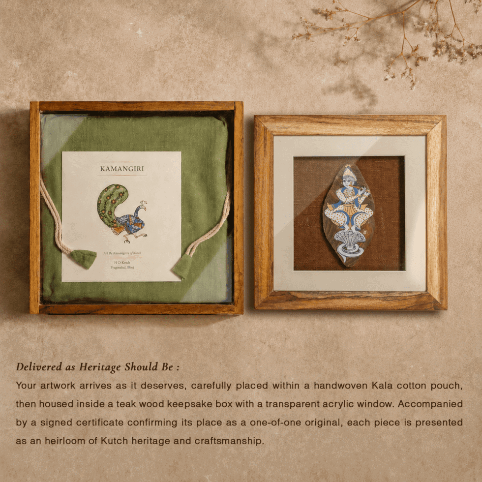 Kutch heritage artwork displayed in wooden frame with certificate.