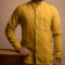 Yellow traditional kurta with white vertical stripes for men.