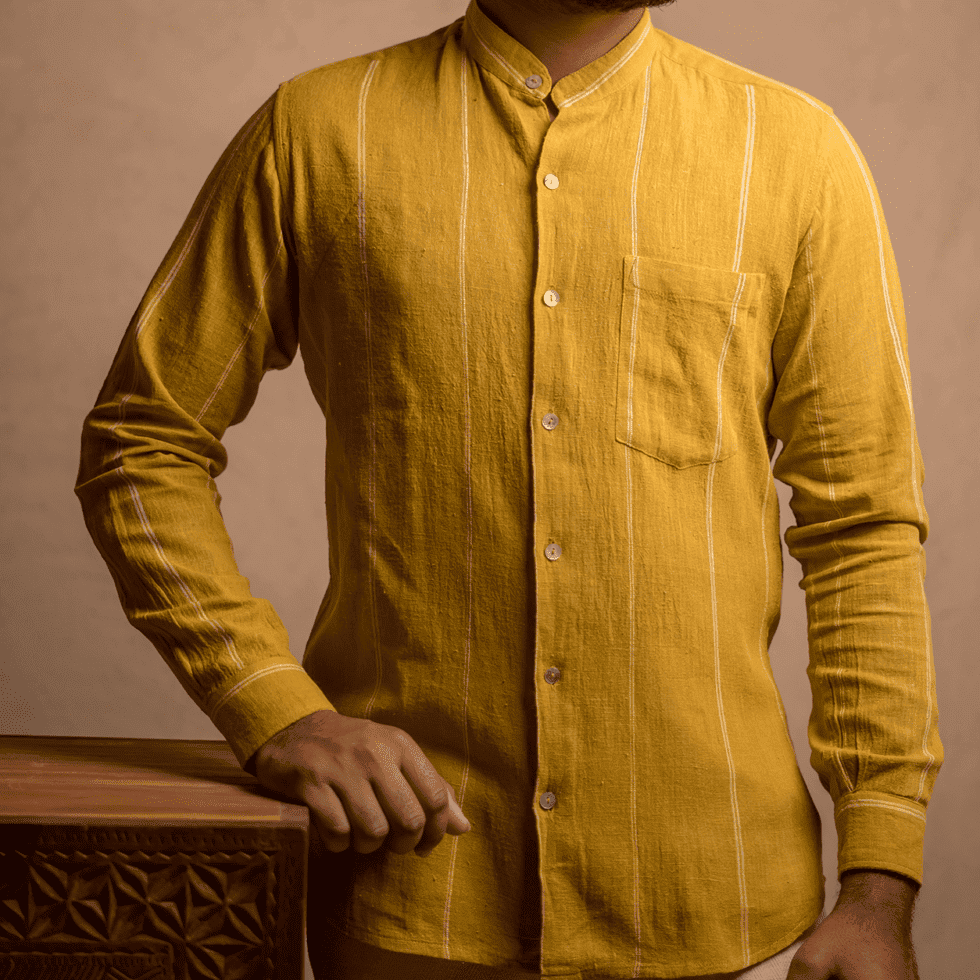 Yellow traditional kurta with white vertical stripes for men.